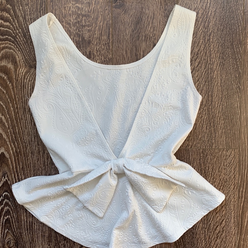 Cute white peplum top!